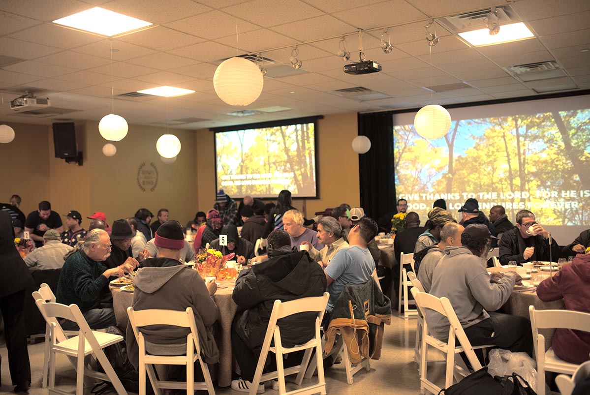 Guests enjoying Thanksgiving at New York City Rescue Mission