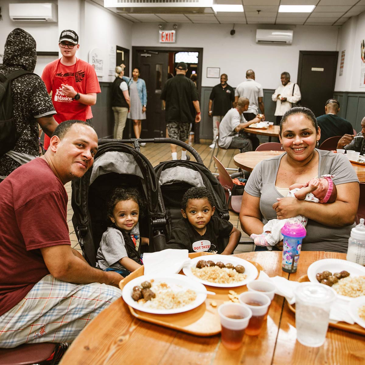 Family eating at The Bowery Mission